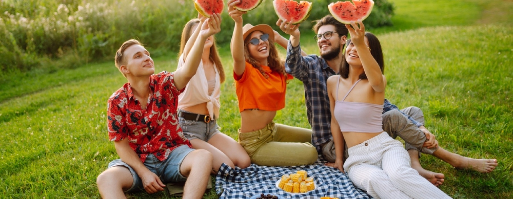 Group of friends holding watermelon 